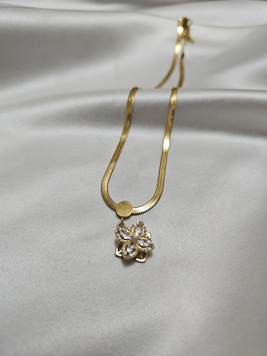 Gold Flower Steel Necklace with Rotating Pendant
