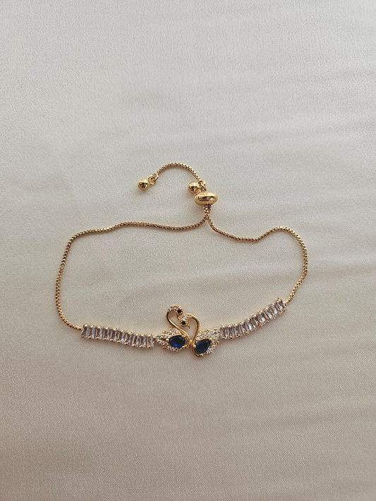 Kuğulu Mavi Taşlı Gold Bileklik